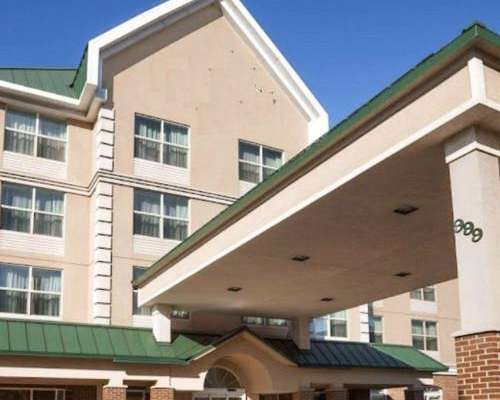 Empty hotel building sits vacant without signage