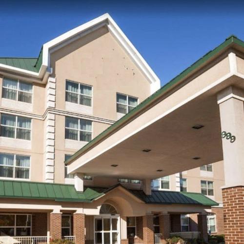 Empty hotel building sits vacant without signage