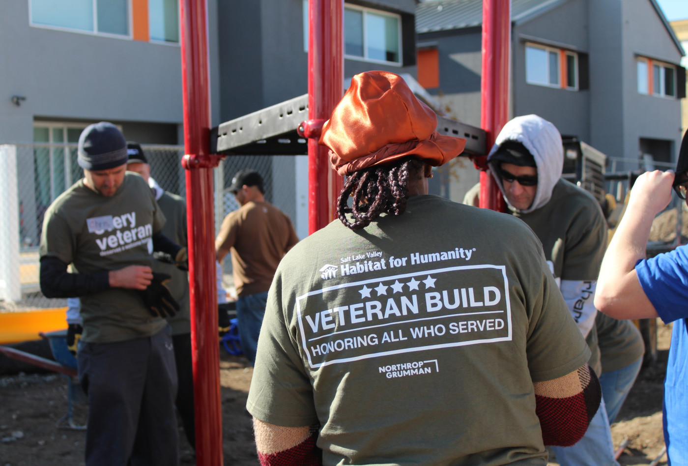 Image of Veterans assembling a metal playground structure